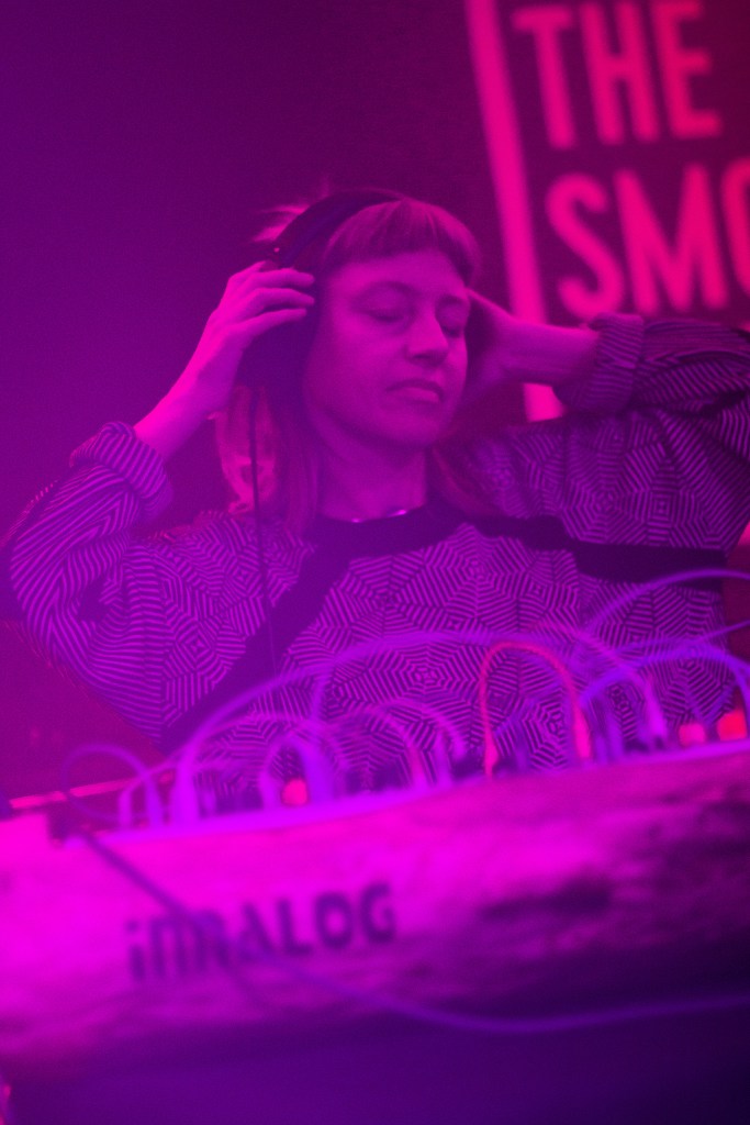 Eyes closed, headphones on, tinted pink ... Loula Yorke live at The Smokehouse Presents